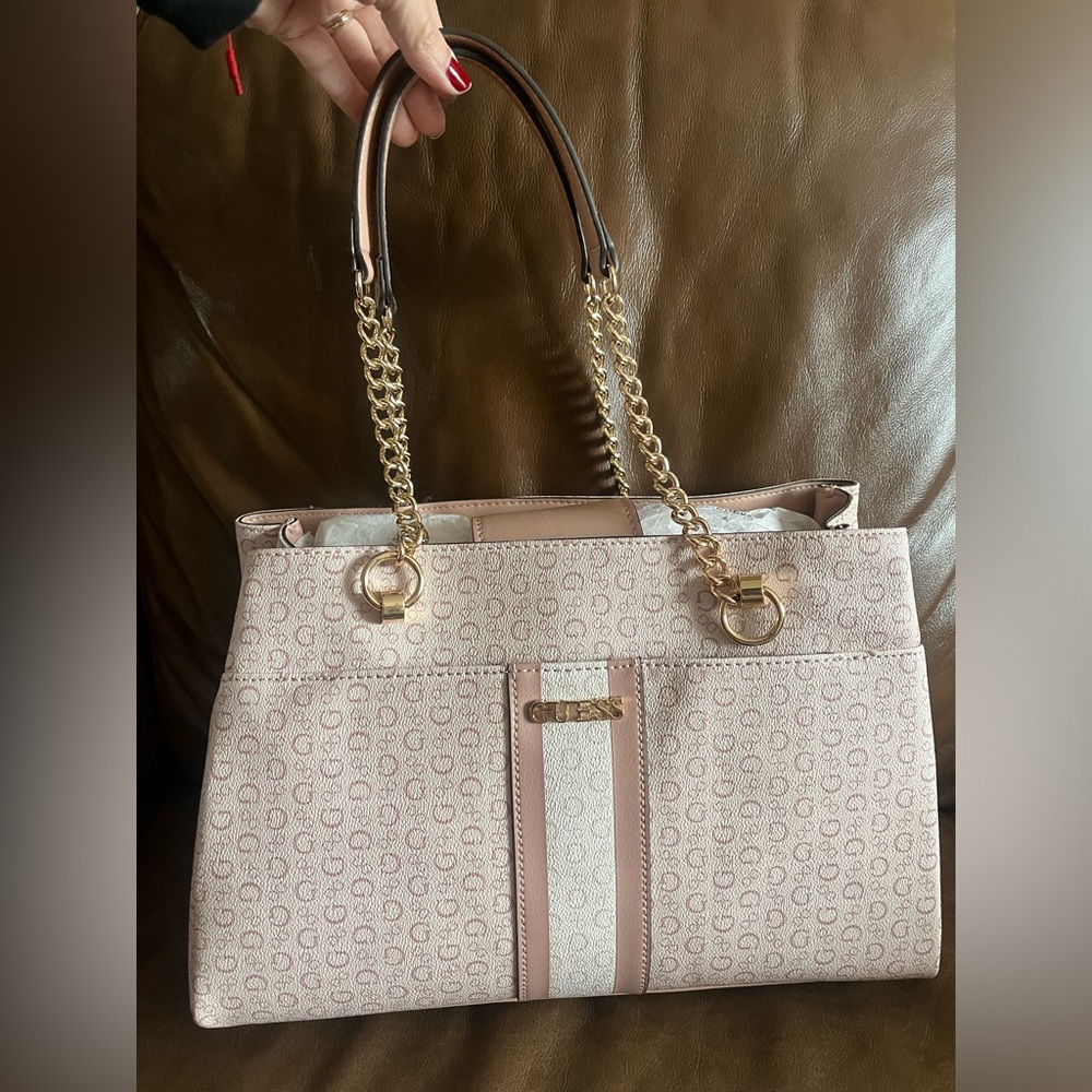 Guess light pink double strap handbag.